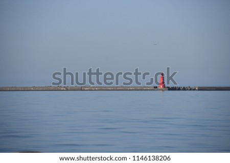 Scenery background of the lighthouse in the ocean at Hokkaido Japan