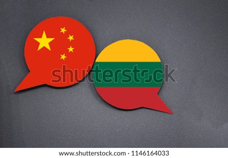 China and Lithuania flags with two speech bubbles on dark gray background