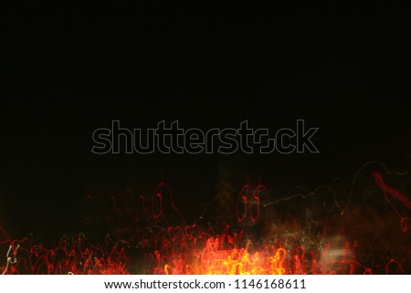 Noise,blur and colored abstract city lights texture.