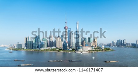 shanghai skyline panorama and busy huangpu river 