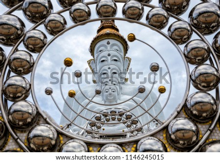 White Buddha Statue at Wat Prathat Phasornkaew Thailand