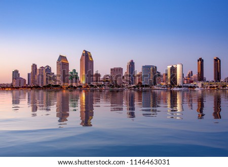 Sunset illuminating the tall skyscrapers of San Diego in California from Centennial Park in Coronado with artificial water reflection Royalty-Free Stock Photo #1146463031