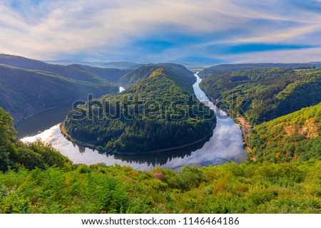 Unique landscape and landmark of the Saarland with a view to Saar river bend in Germany Royalty-Free Stock Photo #1146464186