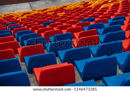 Multicoloured plastic stadium seats