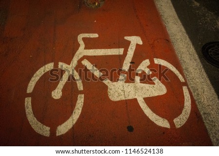 Cycle path symbol on the streets of Novara, Italy