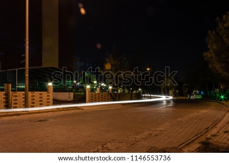 long exposure shoot from a calm street at dark night. photo has taken from izmir/turkey.