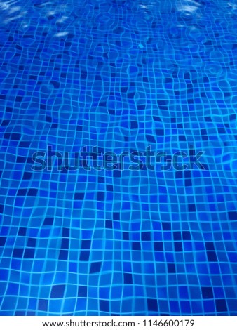 texture of blue water of the pool. Water with Coleen background