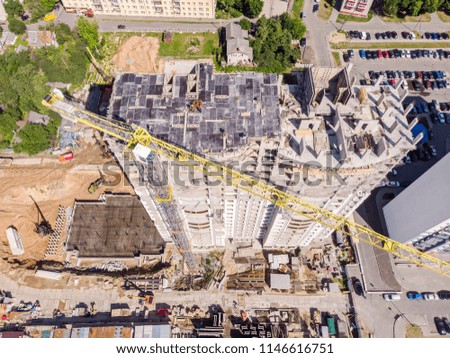 development of new residential area. aerial photo of construction site with crane