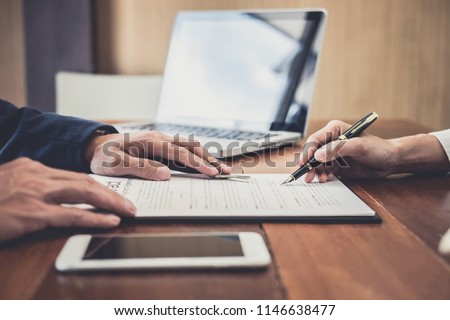 Sales manager filing keys to customer after signing rental lease contract of sale purchase agreement, concerning mortgage loan offer for and house insurance. Royalty-Free Stock Photo #1146638477