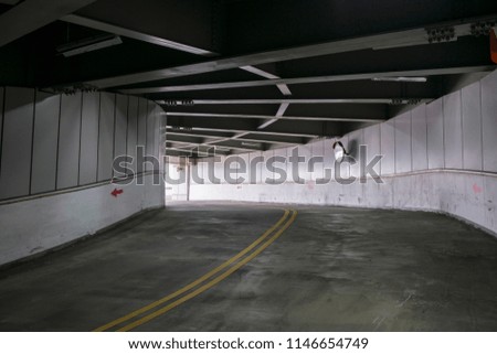 The dark parking lot exit