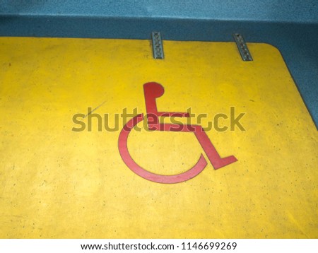 Symbol of a wheelchair space on the city bus.