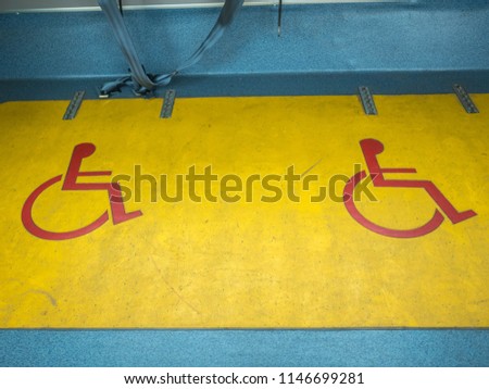 Symbol of a wheelchair space on the city bus.
