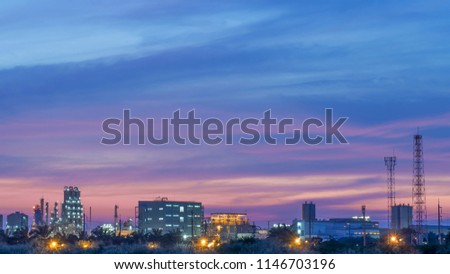 Petrochemical plant in Asia at night for your design, card, postcard, wallpaper or your concept,Copy space for you text.

