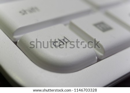 Close-up keyboard buttons. Selected Focus on control button
