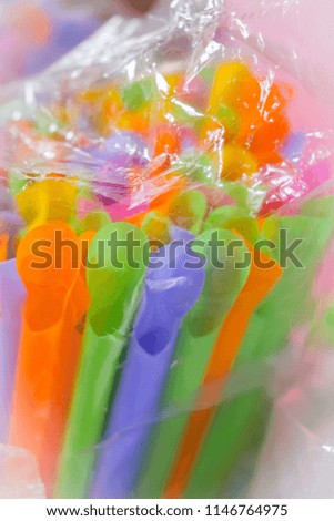 Colorful Straw in package soft focus concept.
