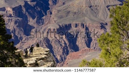 Photographing on the edge of the South Rim in front of the spectacular Grand Canyon.