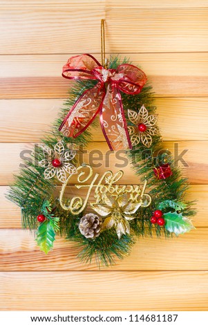 Christmas Wreath on wooden background