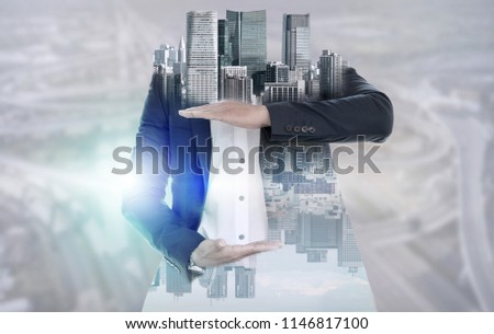 Surreal businessman open hand for your text - Businessman opening palms making hand gestures to build copy space for your business text or logo with modern city in background.