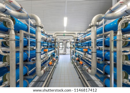 blue pipelines in a waterworks Royalty-Free Stock Photo #1146817412