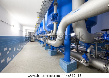 pipelines in a waterworks Royalty-Free Stock Photo #1146817415