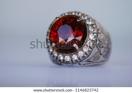 Beautiful natural color garnet stone, orangish red with silver ring.