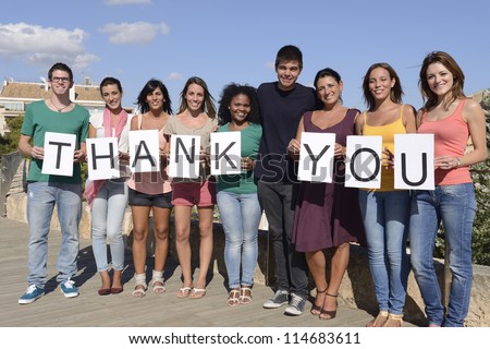 Group of diverse people holding sign Thank Royalty-Free Stock Photo #114683611