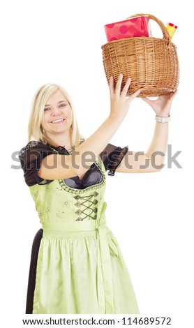 Young woman carries a basket with gifts