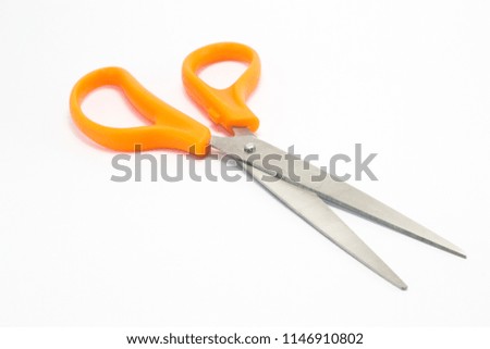 Scissors in white background