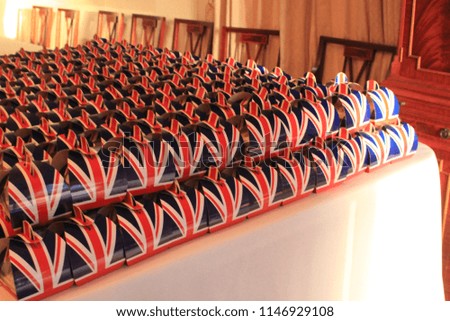Rows of Union Jack decorated boxes symbolising the United Kingdom and British Royal family