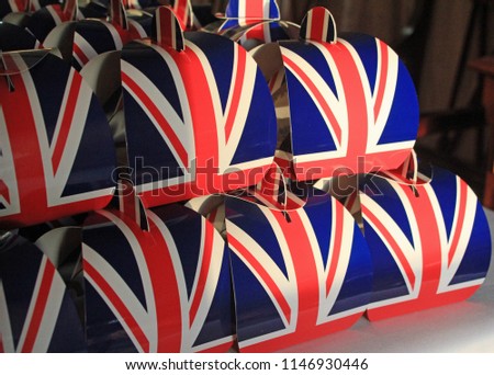 Close up of rows of Union Jack decorated boxes symbolising the United Kingdom and British Royal family