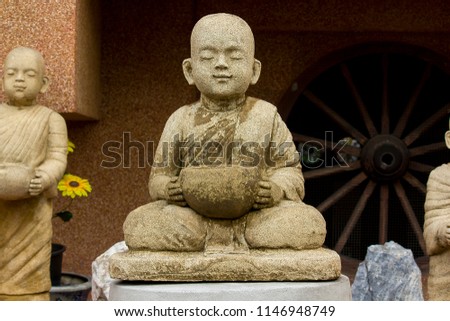 Statue of a monk meditating