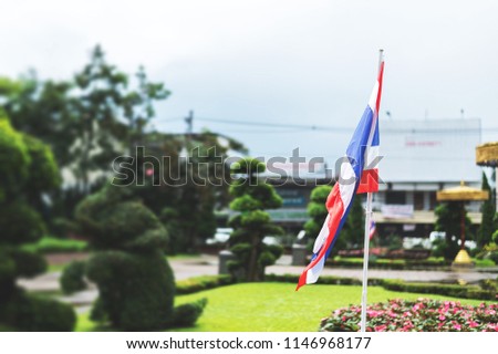 Thai (Thailand) National flag with soft-focus and over light in the background