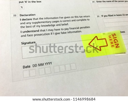 Tax return declaration with sign here sticker