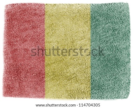 The Guinean flag painted on grey towel