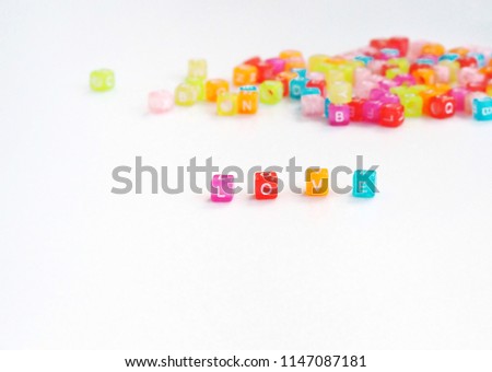 Colorful cube beads with LOVE letter on white background