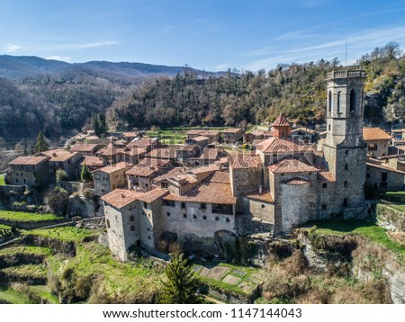 Aerial day view of a picturesque medieval village Rupit in Girona, Catalonia, Spain Royalty-Free Stock Photo #1147144043