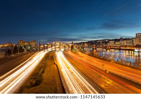 Portland Oregon Downtown Cityscape with Interstate Freeway Traffic Light Trails during Evening Blue Hour