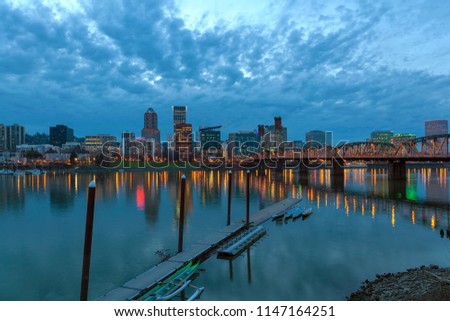 Portland Oregon Downtown City Skyline Along Willamette River at Blue Hour After Sunset