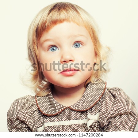 little cute blonde girl isolated on white background happy smili