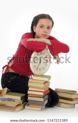Girl schoolgirl with clock and books