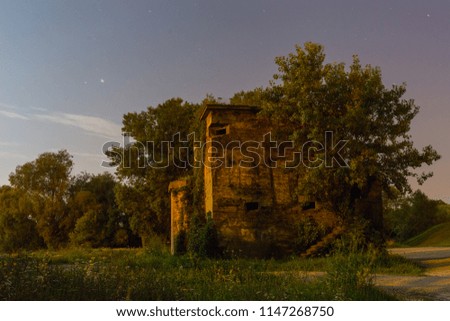 Old abandoned bunker under the night sky