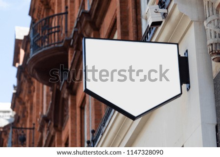 Blank sign outside a shop or restaurant with copy space