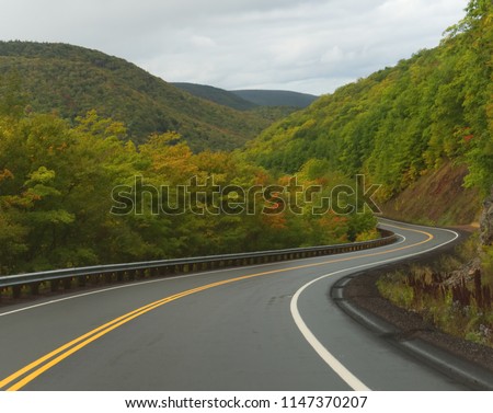 Driving Windy Road Along the Cabot Trail in Autumn        