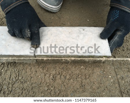 laying paving stones