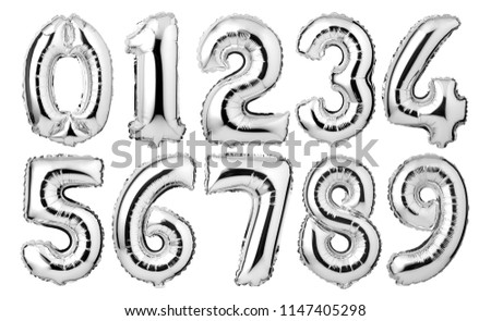 Silver foil number balloons isolated on white background Royalty-Free Stock Photo #1147405298