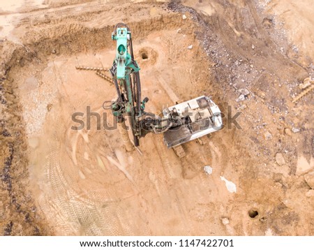 rotary drill at construction site. heavy construction machinery. aerial view