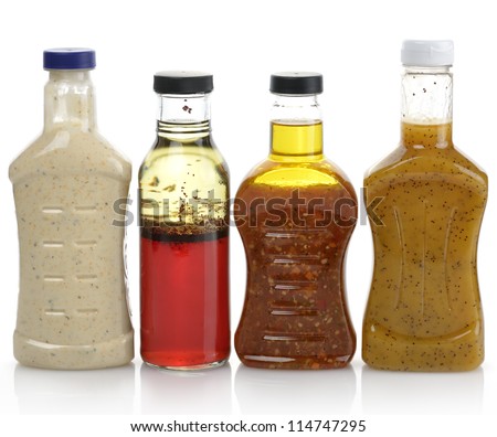Assortment Of Salad Dressing Bottles Royalty-Free Stock Photo #114747295