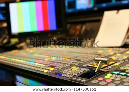 Switcher buttons in studio TV station, Audio and Video Production Switcher of Television Broadcast. Royalty-Free Stock Photo #1147530152