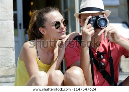 boyfriend taking picture