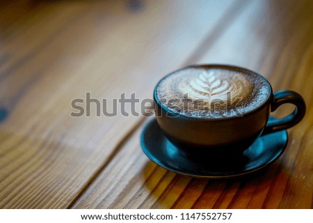 coffee latte art espresso in coffee shop vintage color tone